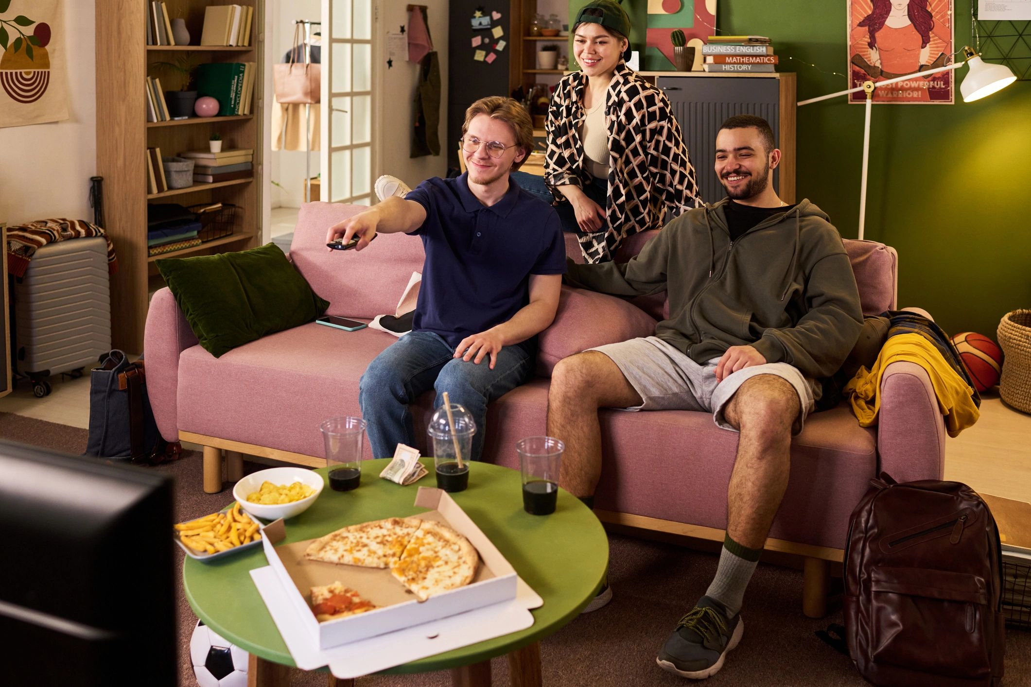 Group watching television together in a hospitality-style setting
